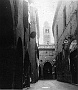 Via s. Sofia nella parte chiamata via Agnello, sullo sfondo chiesa e campanile di S. Francesco